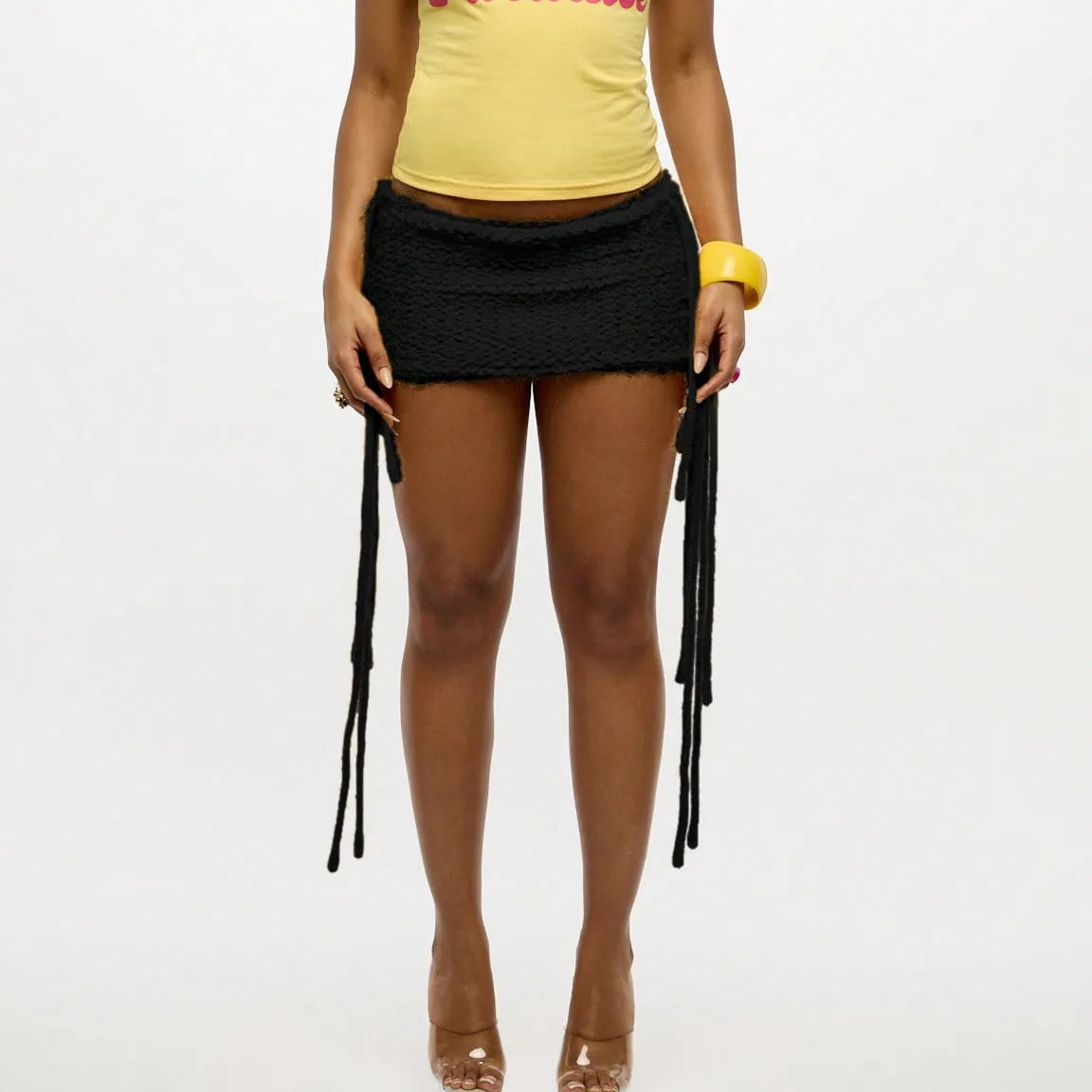 Women's black Y2K mini skirt, perfect for summer outings
