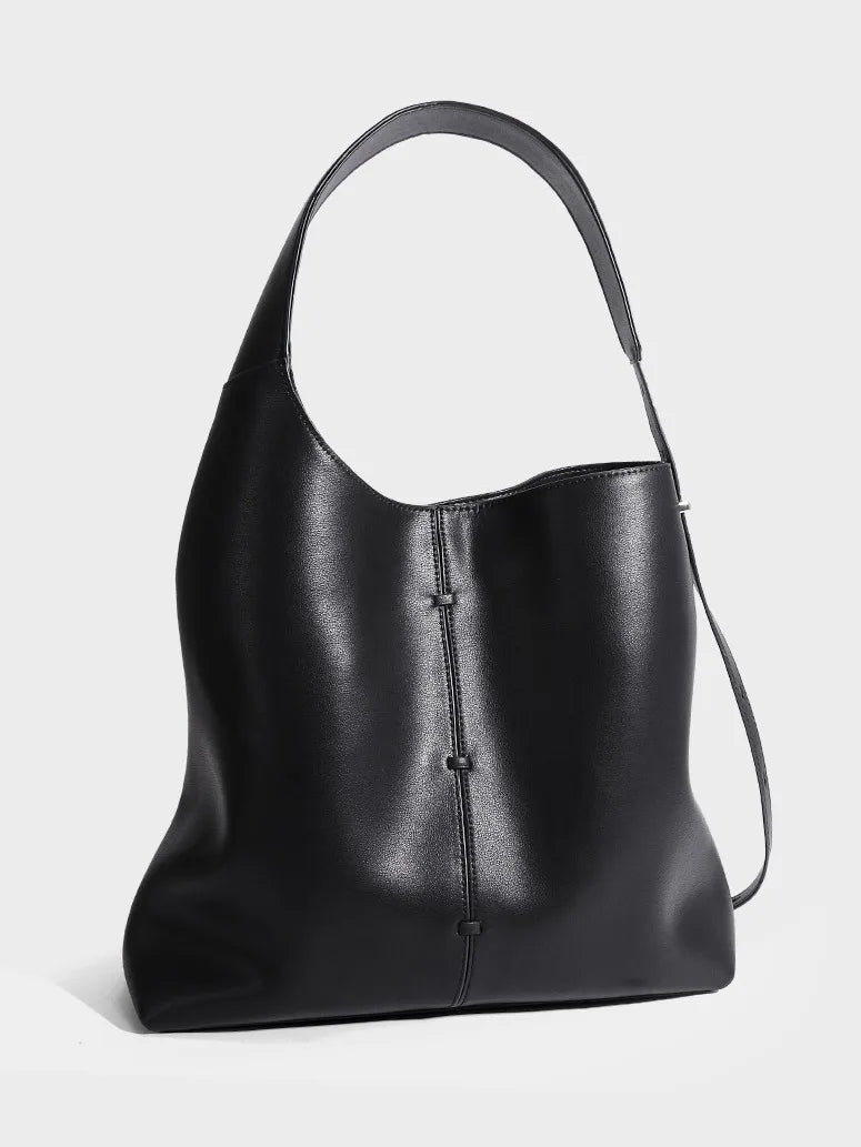 Black leather tote bag, stylish accessory for daily use